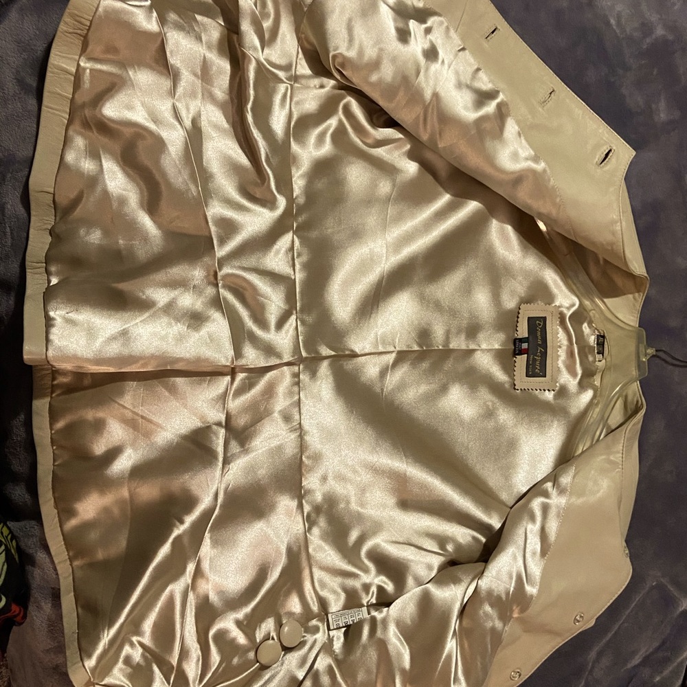 Women’s leather jacket with metallic embroidery. Never worn.